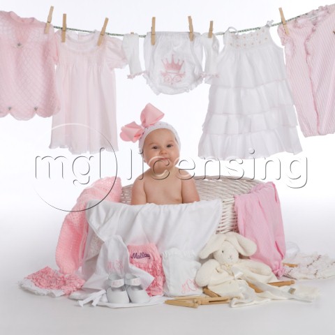 Baby in clothes basket