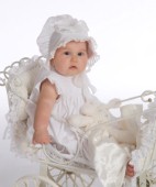 Baby in white pram