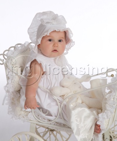 Baby in white pram