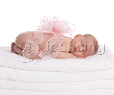 Baby Sleeping On Towels