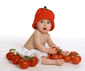 Cute Baby with Tomatoes