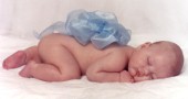 Baby Asleep with Blue Ruffle.jpg