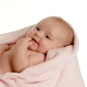 Baby Lying in Pink Fleece.jpg