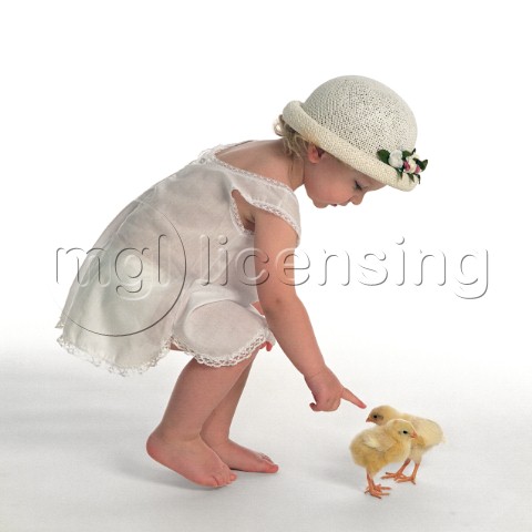 Toddler Playing with Easter Chicksjpg